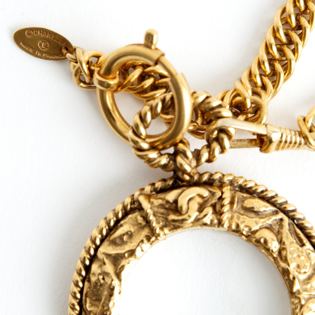 Chanel necklace with magnifying glass pendant - Findage